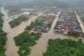 Imagem colorida mostra alagamento por causa de fortes chuvas em Joinville.  Caso está entre desastres naturais de 2022 no Brasil- Metrópoles